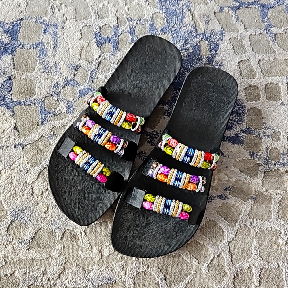 Summer beach sandals. Colored beaded Hawaiian look
